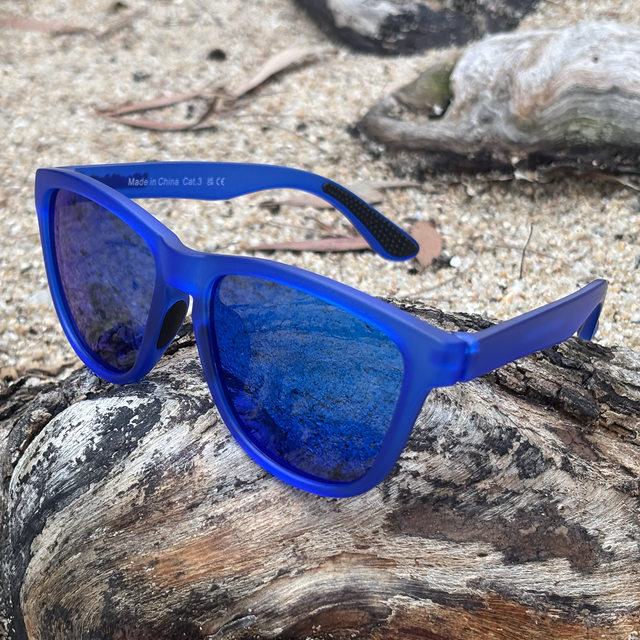 Blue Drifter Floating Sunglasses On Beach